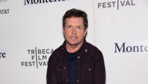 Image of Michael J Fox posing for a photo.